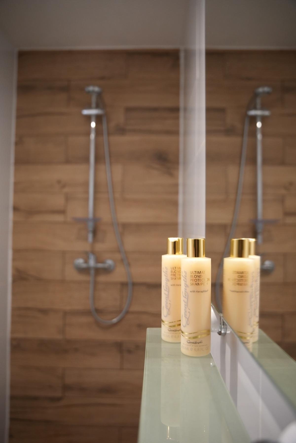 Bathroom detail with shower amenities