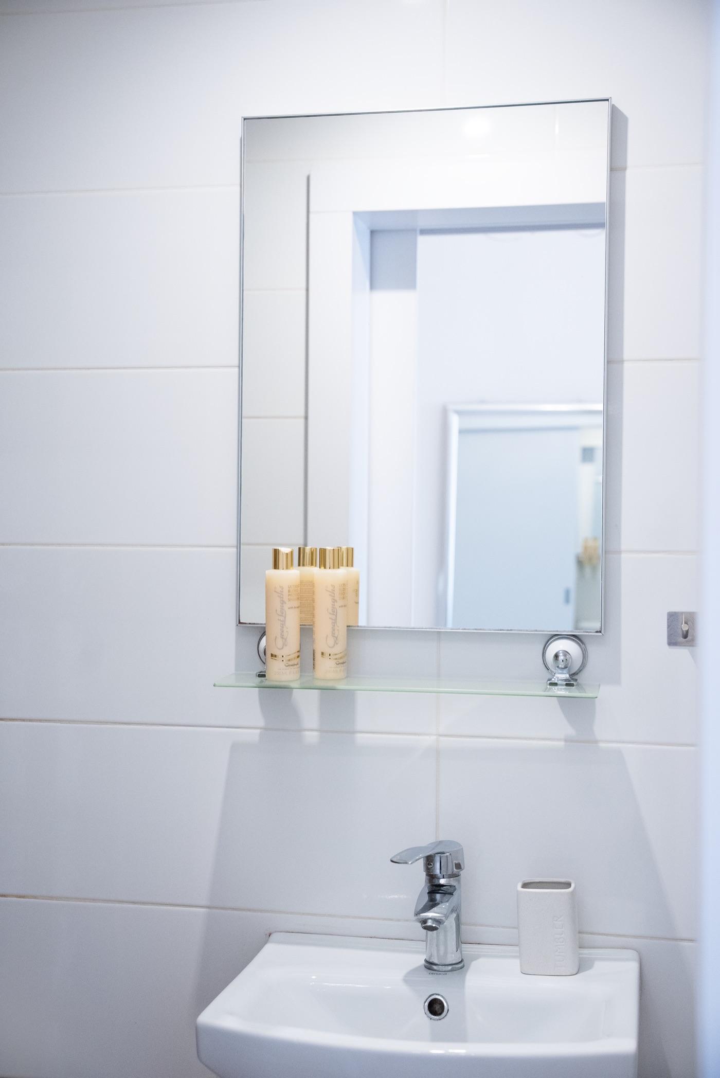 Elegant bathroom with mirror and vanity