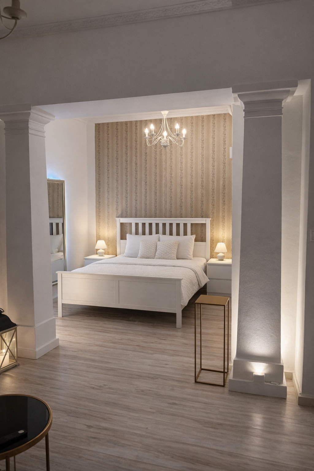 Evening bedroom view framed by the signature columns